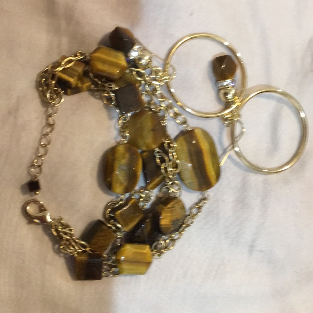 Tiger bracelet set. In 14 k plated.